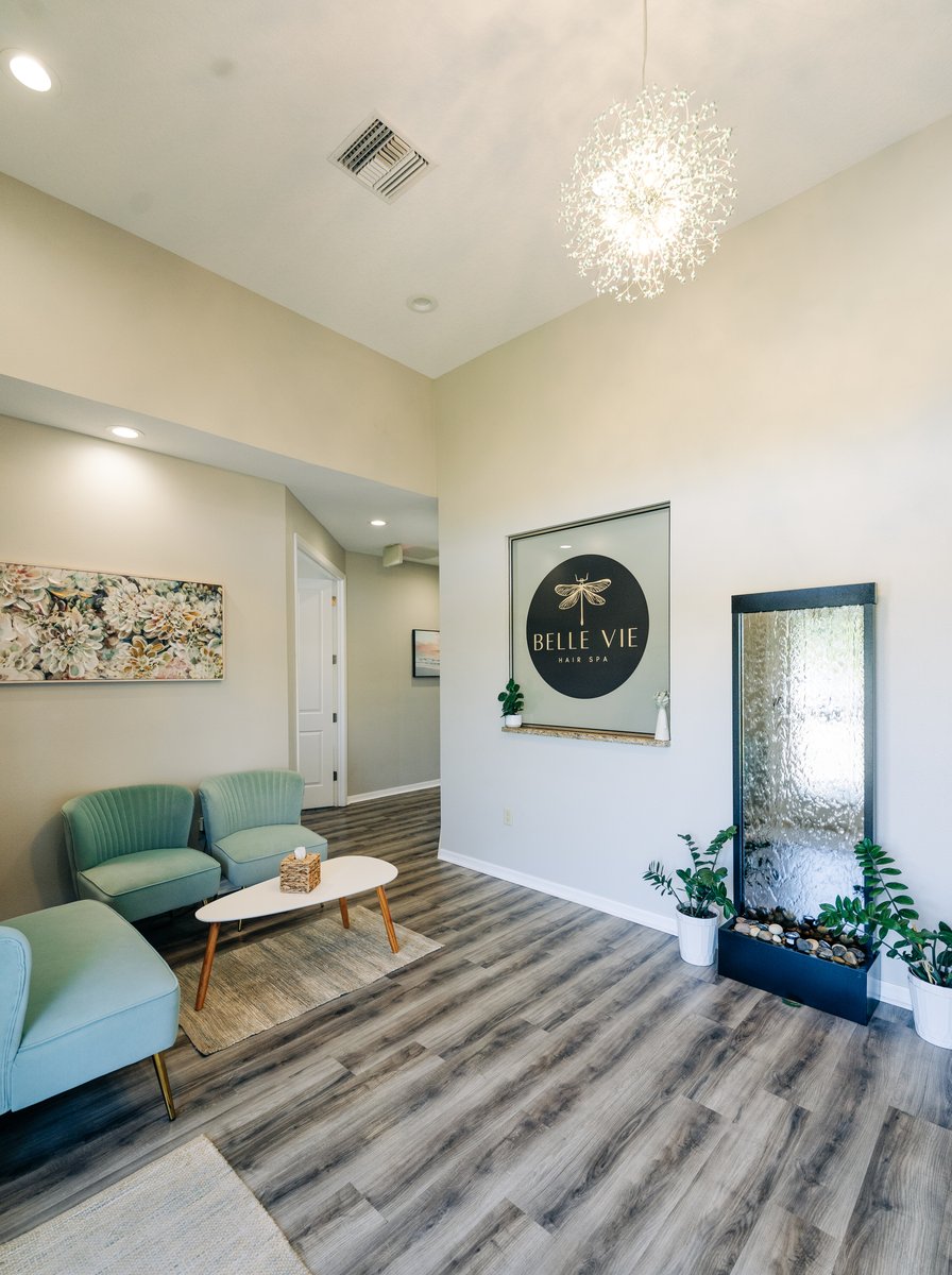 Belle Vie welcome lounge with velvet seating and water feature