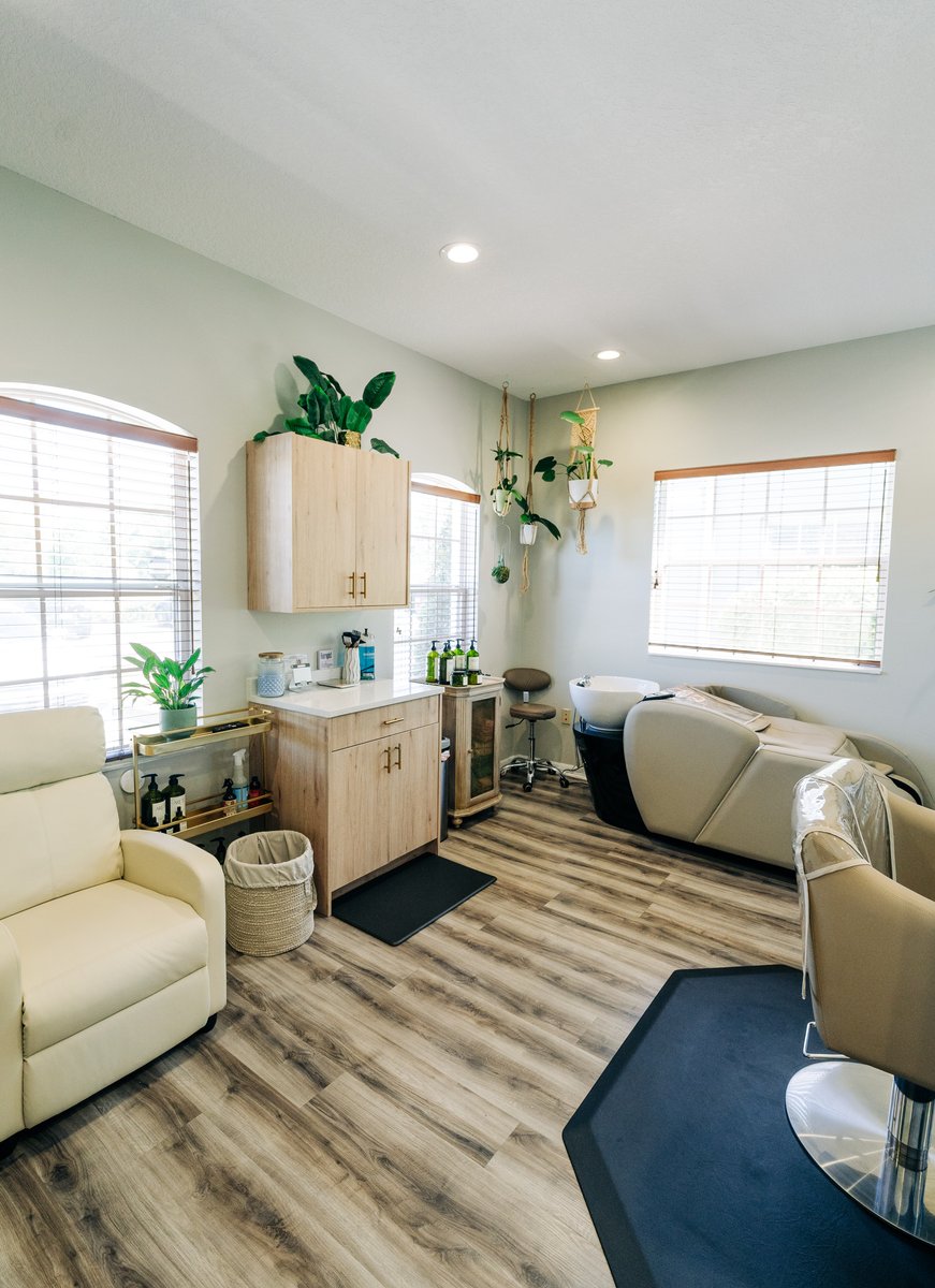 Belle Vie salon floor — styling station and shampoo area