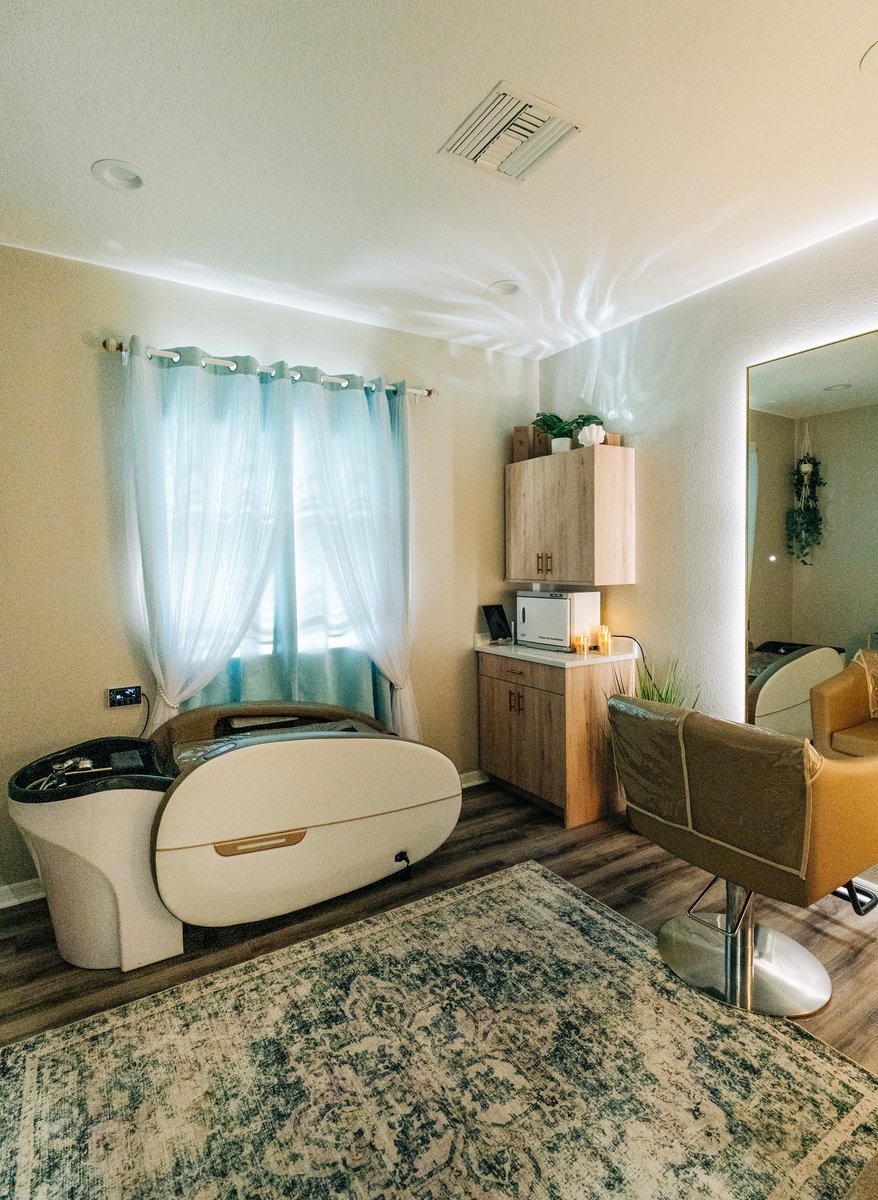 Private head spa suite with treatment pod and styling mirror